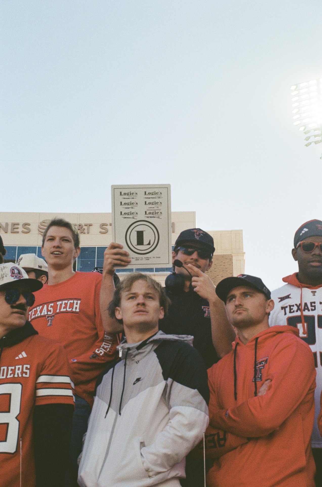 Tt Fans Holding Signs